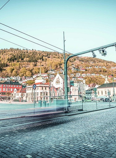 Photo shows a street with an EFKON MLFF toll system 