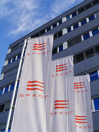 The image shows EFKON Headquarters in Raaba, Austria