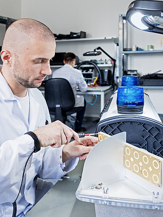 Image shows an EFKON engineer 