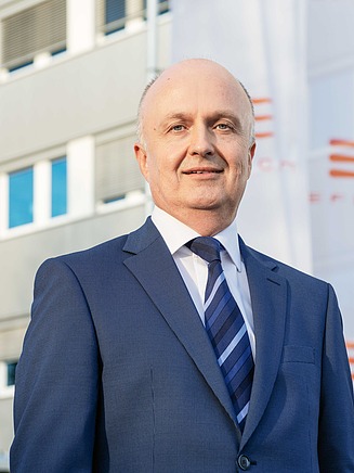 The image shows Norbert Hofmann